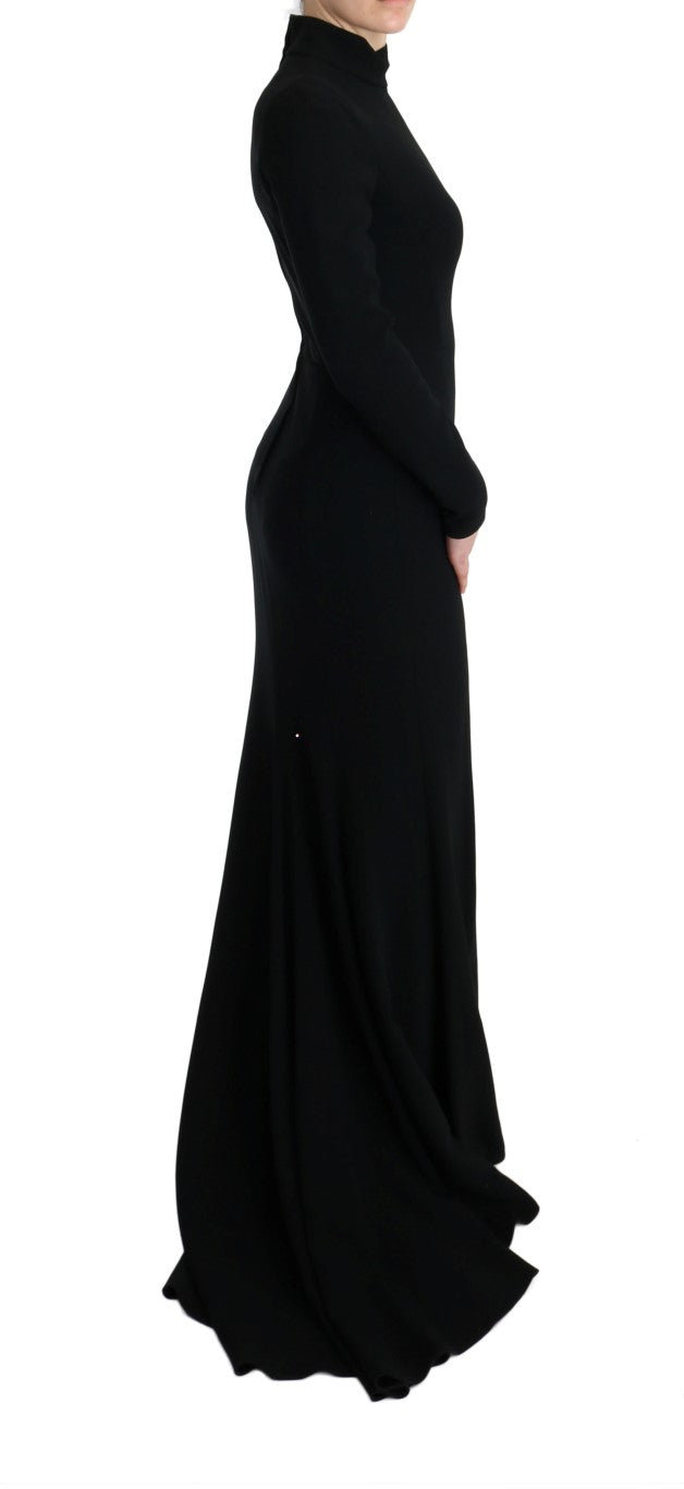Robe noire longue Dolce & Gabbana en tissu stretch, coupe ajustée et élégante, idéale pour une occasion spéciale.