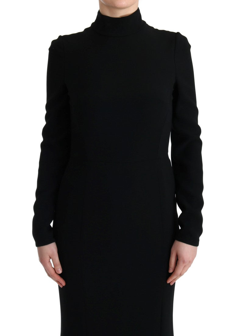 Robe longue noire Dolce & Gabbana ajustée en tissu stretch, style robe fourreau élégante pour femme.