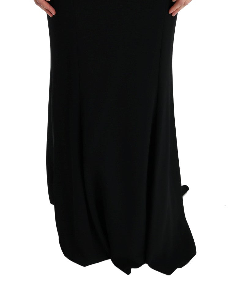 Robe longue noire Dolce & Gabbana en tissu stretch, coupe ajustée et élégante, pour une silhouette sophistiquée.