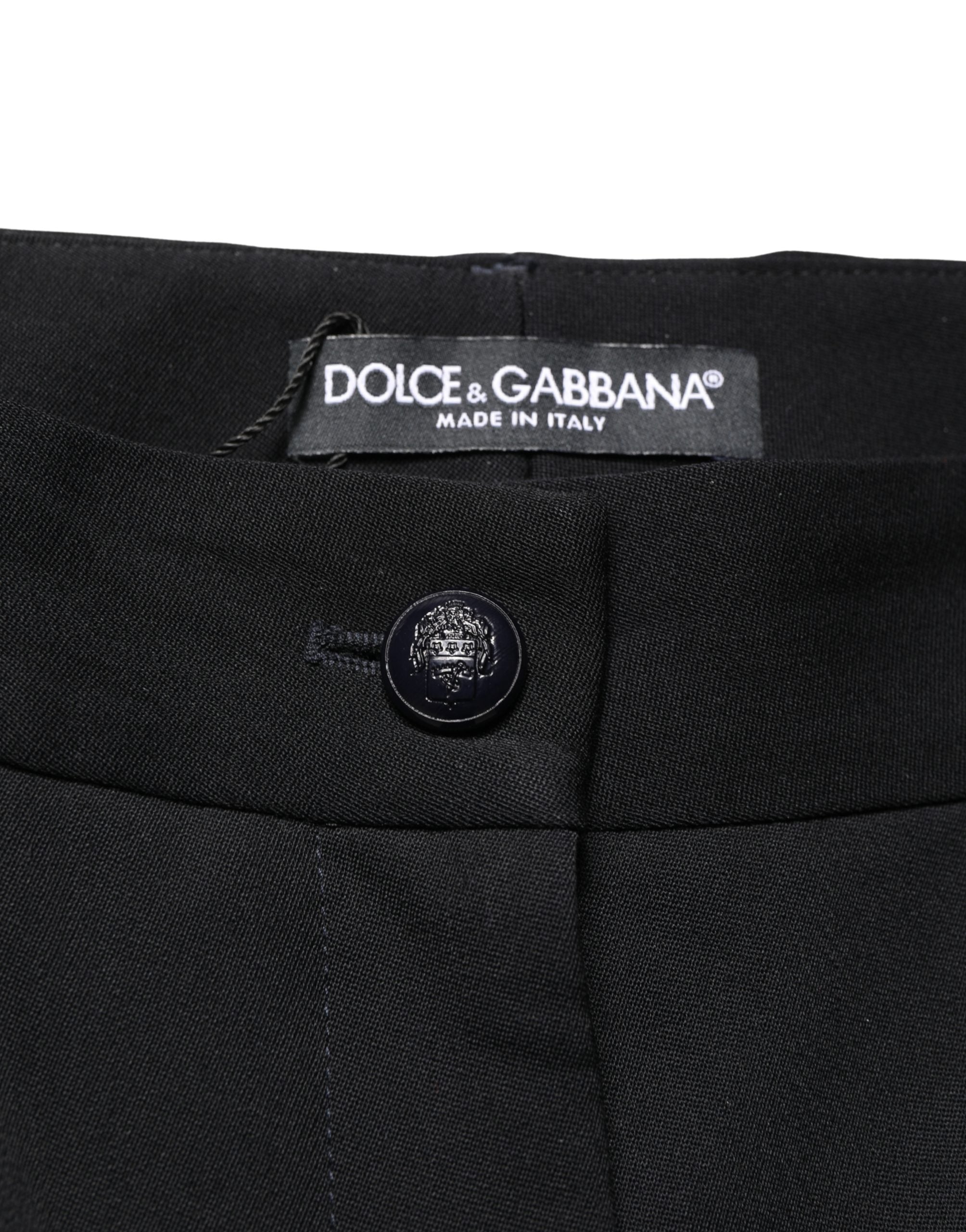 Pantalons toniques noirs en laine Dolce & Gabbana, taille haute, coupe raccourcie et tapered, détail visible sur l’image.
