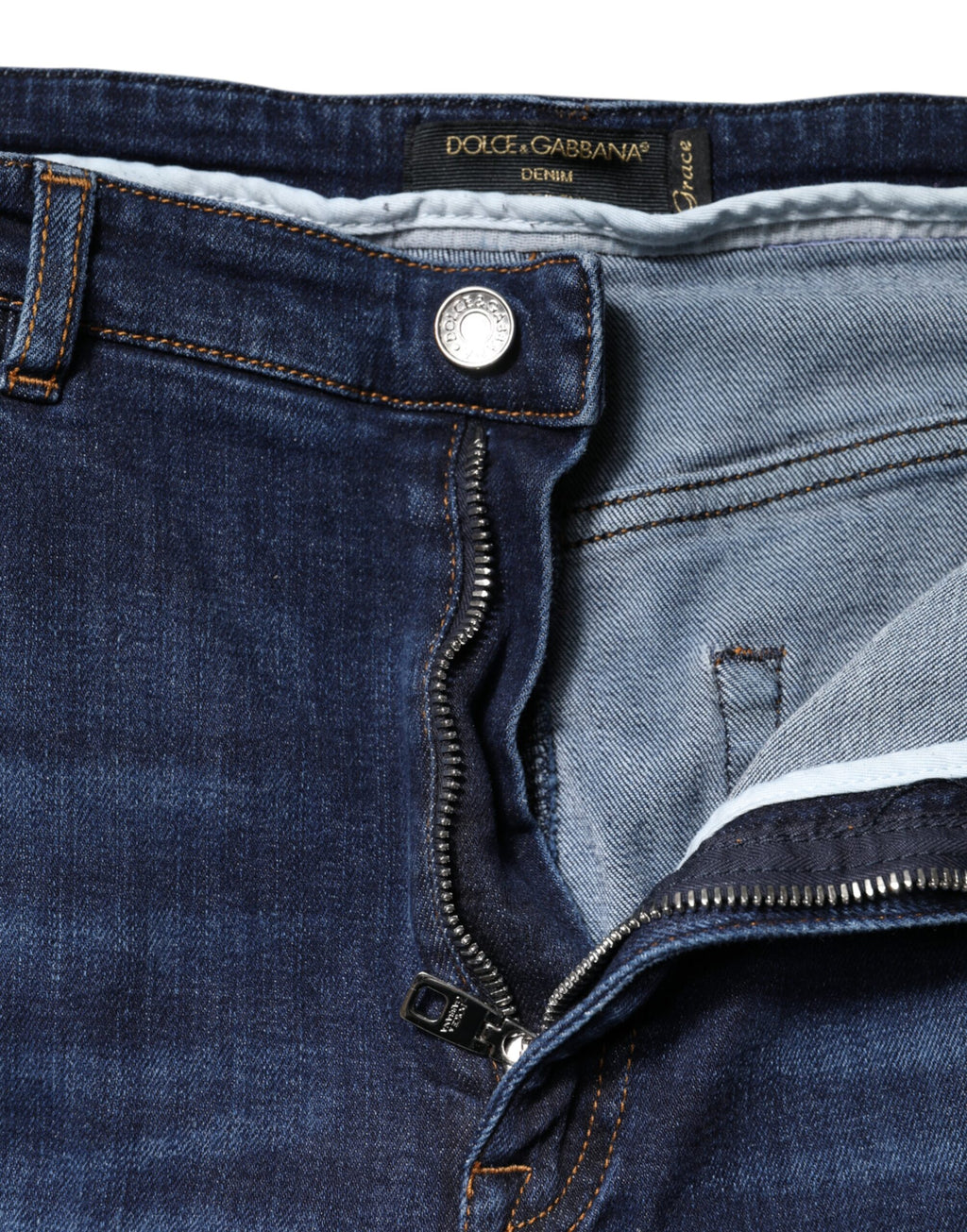 Jeans en denim bleu Dolce & Gabbana, taille haute et coupe courte, avec poche arrière et finition délavée.