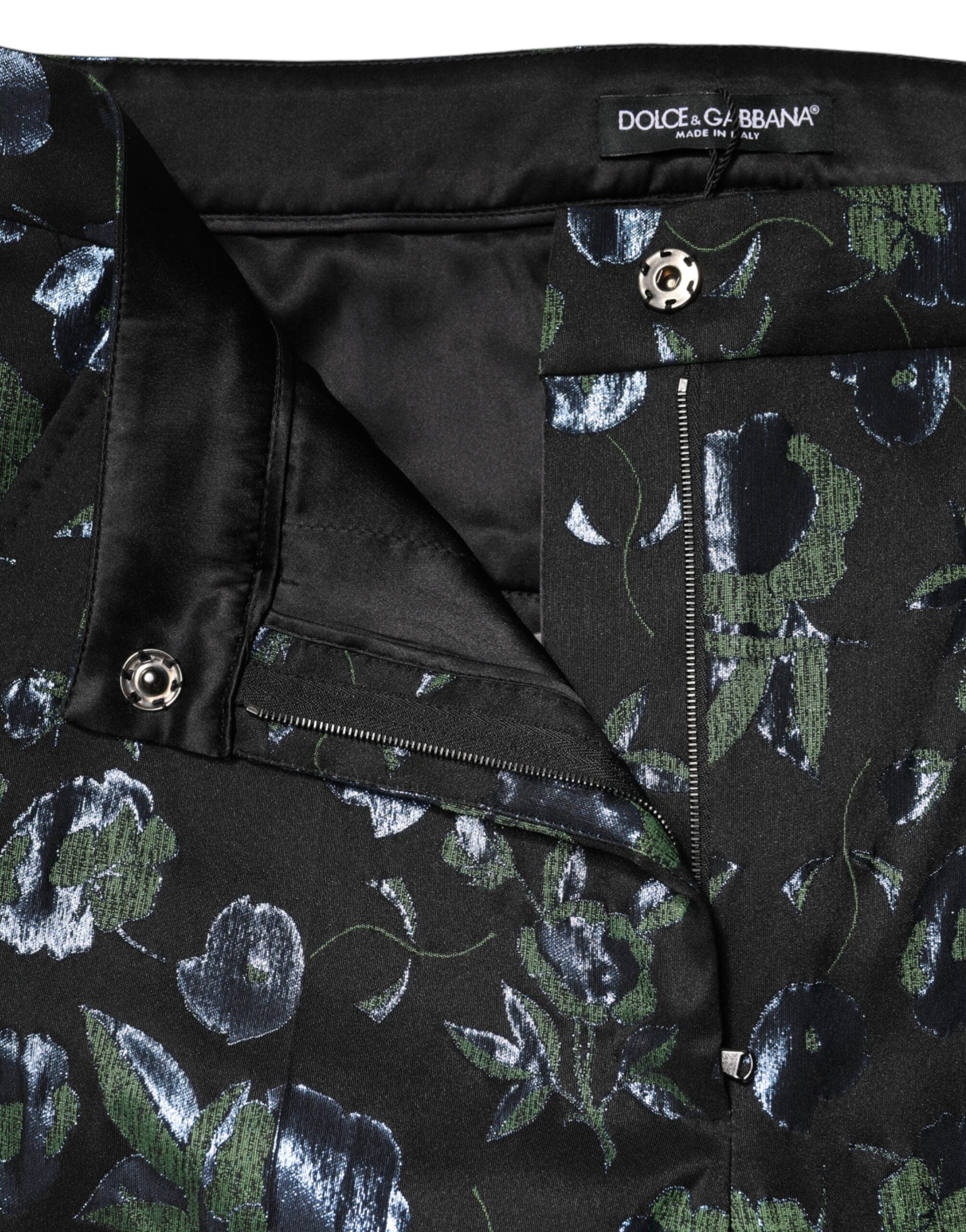 Pantalon slim floral métallique bleu et vert de Dolce & Gabbana, tissu élégant et détails floraux raffinés.