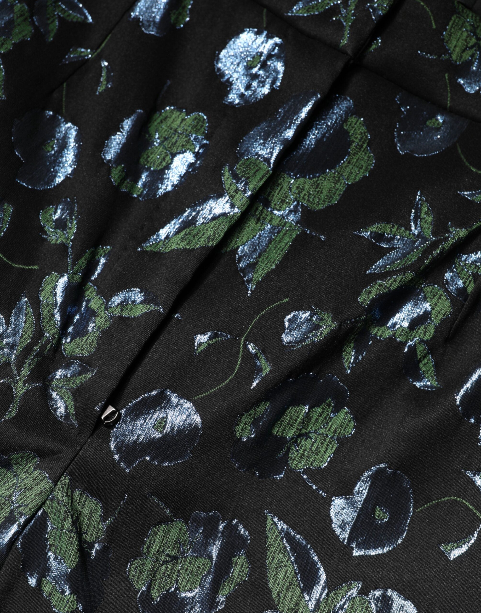 Pantalon slim floral métallique bleu-vert Dolce & Gabbana, style élégant avec motif floral brillant et coupe ajustée.