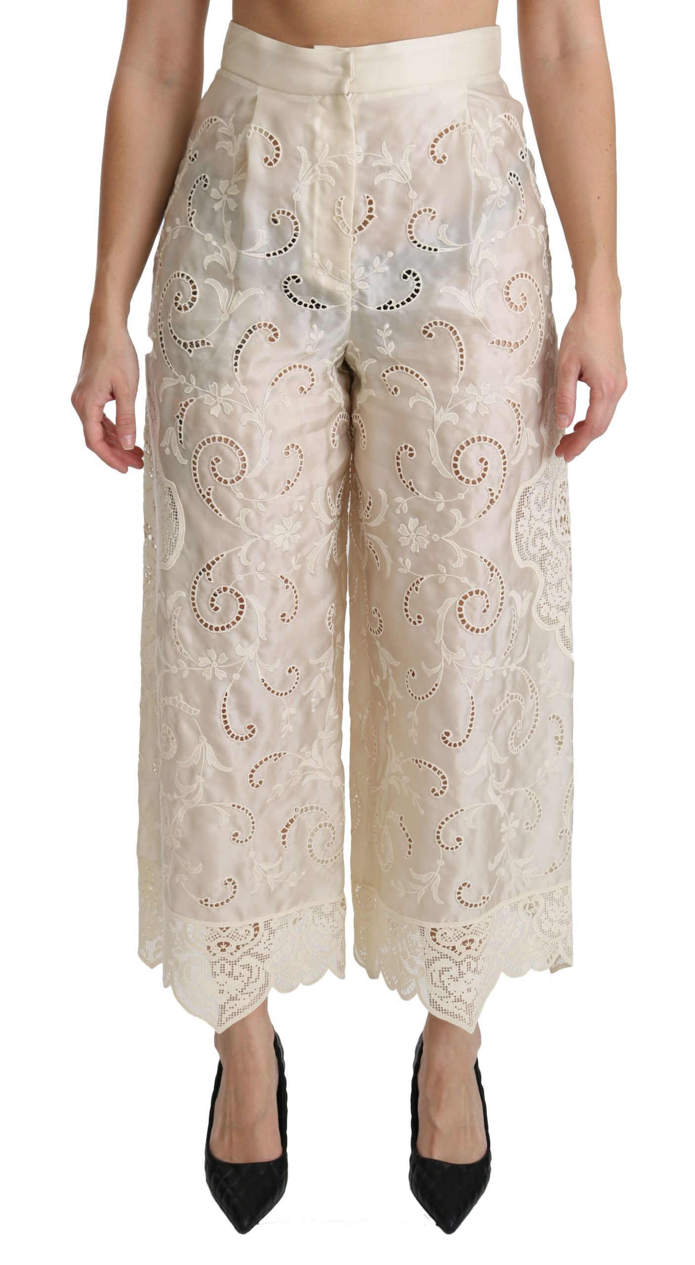 Pantalons palazzo courts en dentelle crème Dolce & Gabbana, taille haute, avec détails élégants et coupe fluide.