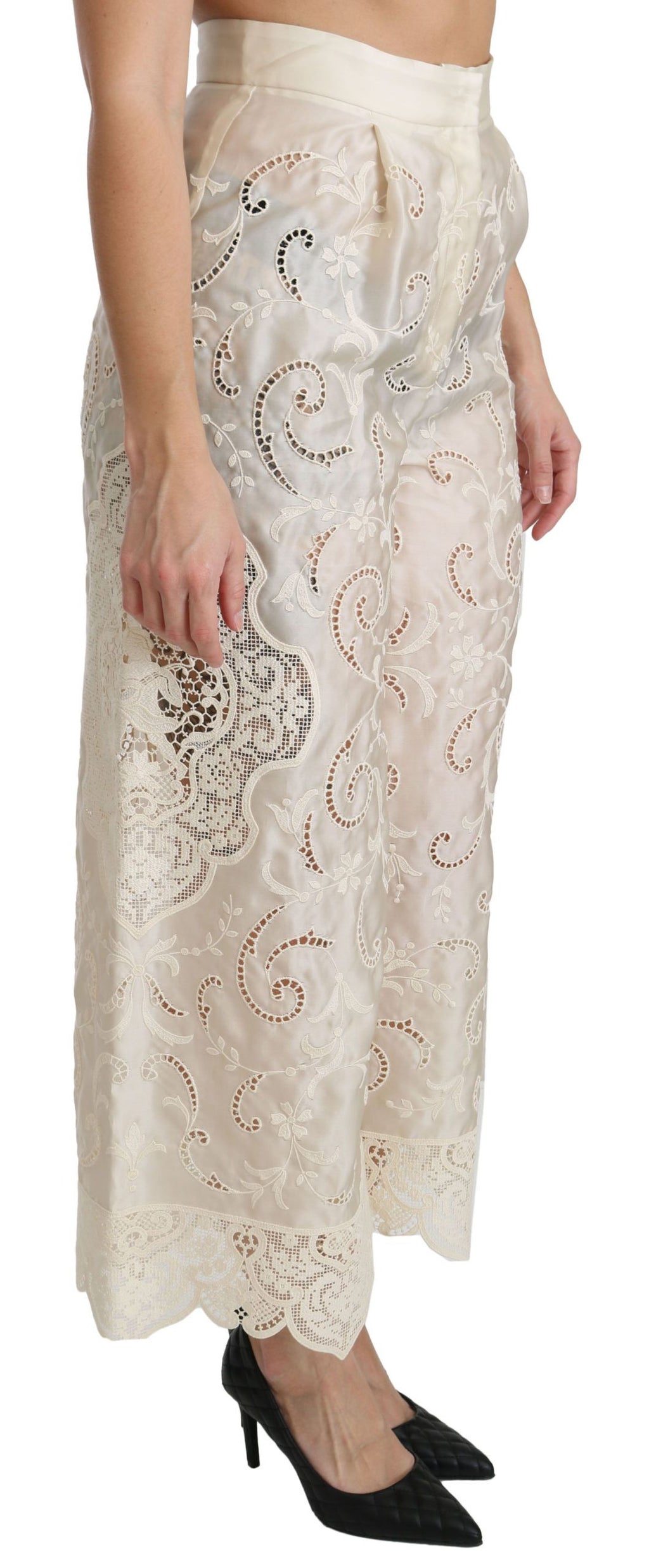 Pantalons palazzo crème Dolce & Gabbana en dentelle, taille haute et cropped, avec un style élégant et sophistiqué.