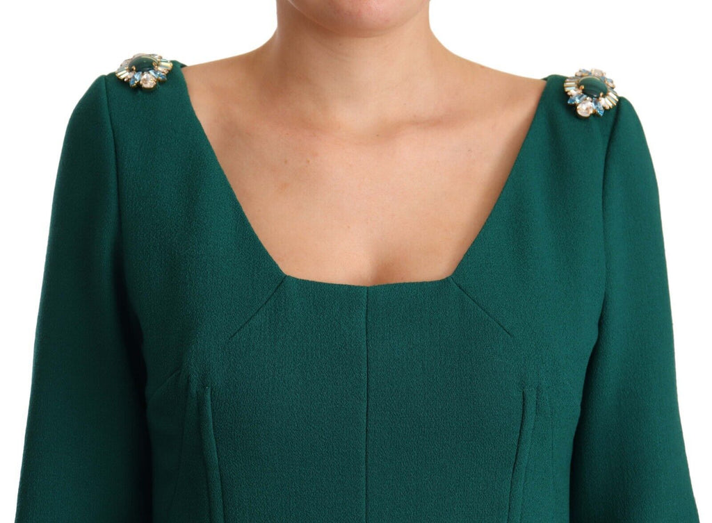 Robe midi en crêpe vert stretch de Dolce & Gabbana avec cristaux, élégante et ajustée, vue en gros plan sur le tissu et les détails.