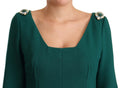 Robe midi en crêpe vert stretch de Dolce & Gabbana avec cristaux, élégante et ajustée, vue en gros plan sur le tissu et les détails.