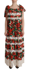 Robe longue en dentelle Dolce & Gabbana à imprimé multicolore de géranium, style maxi avec détails élégants visible sur l'image.