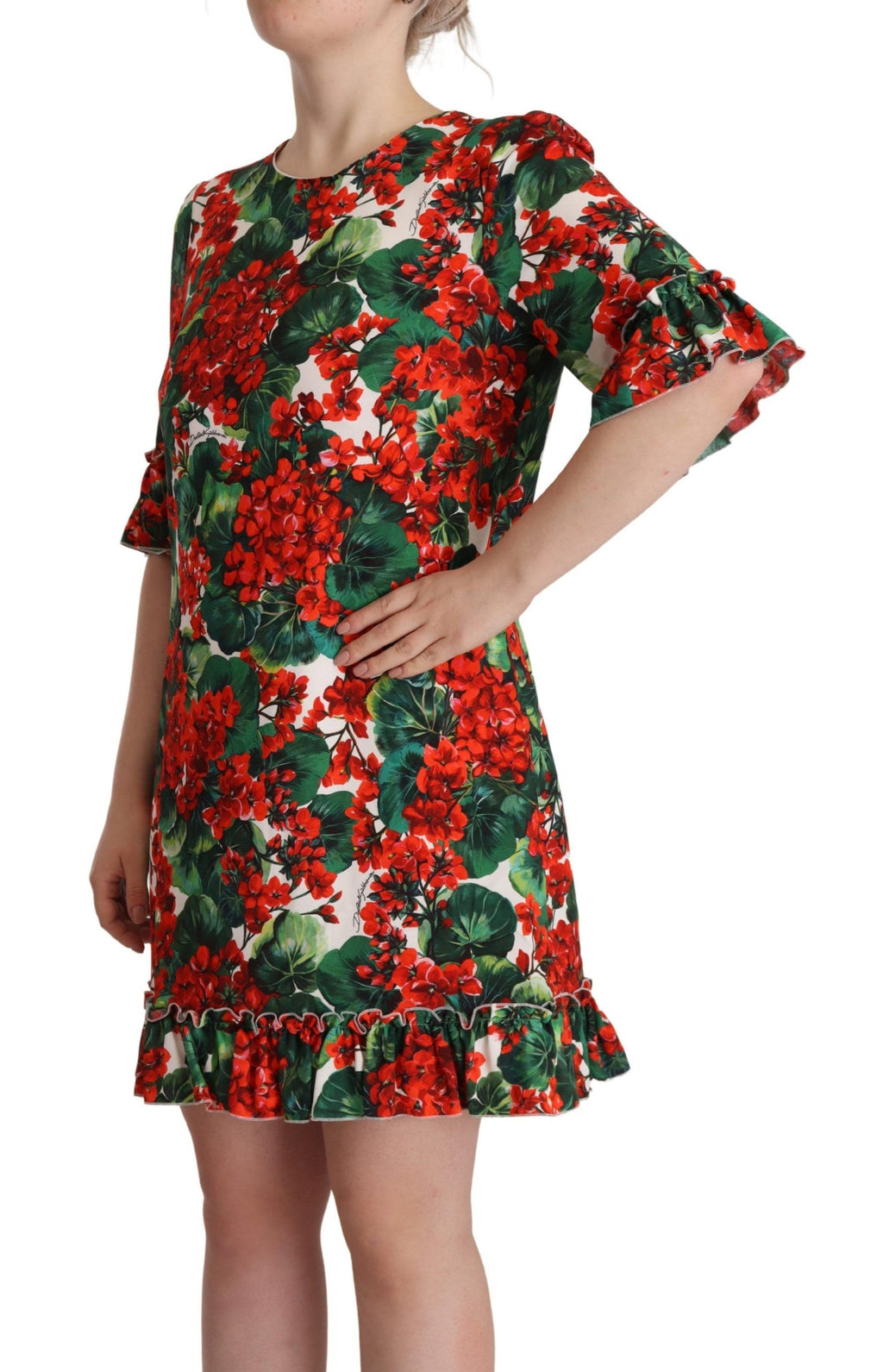 Robe de soirée Dolce & Gabbana à fleurs multicolores et rouge, coupe shift élégante, tissu fluide et détails floraux.