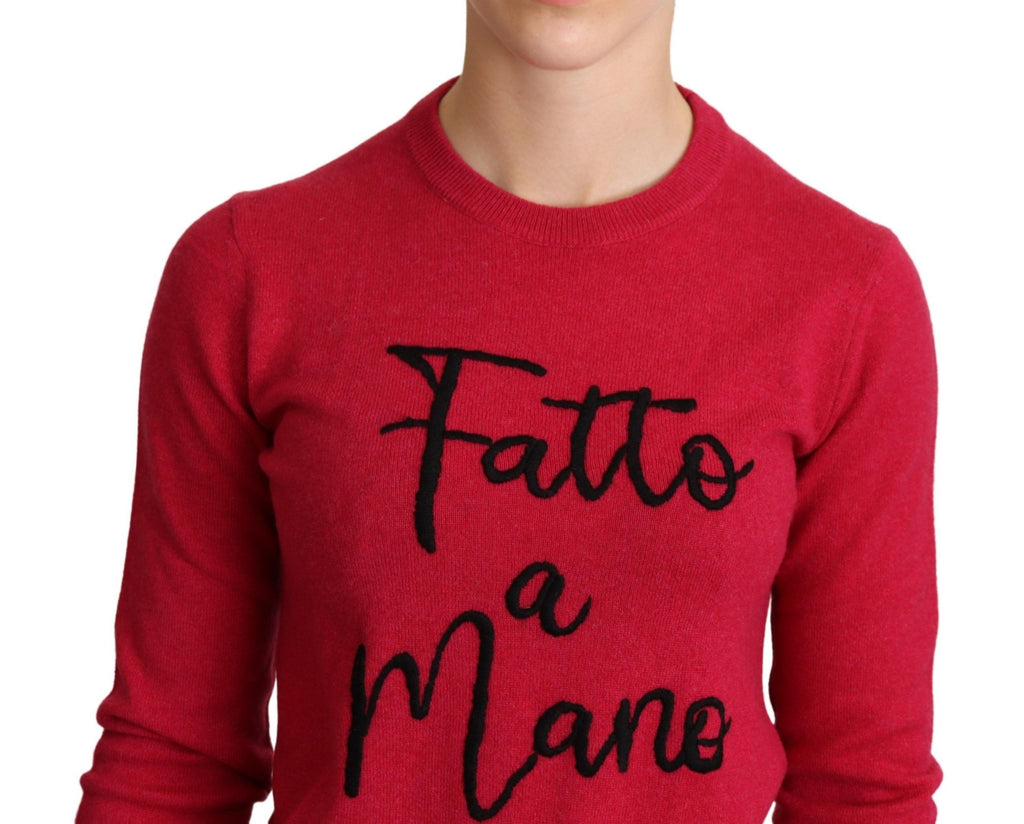 Pull en cachemire et laine rose Dolce & Gabbana avec broderies élégantes, doux et confortable.