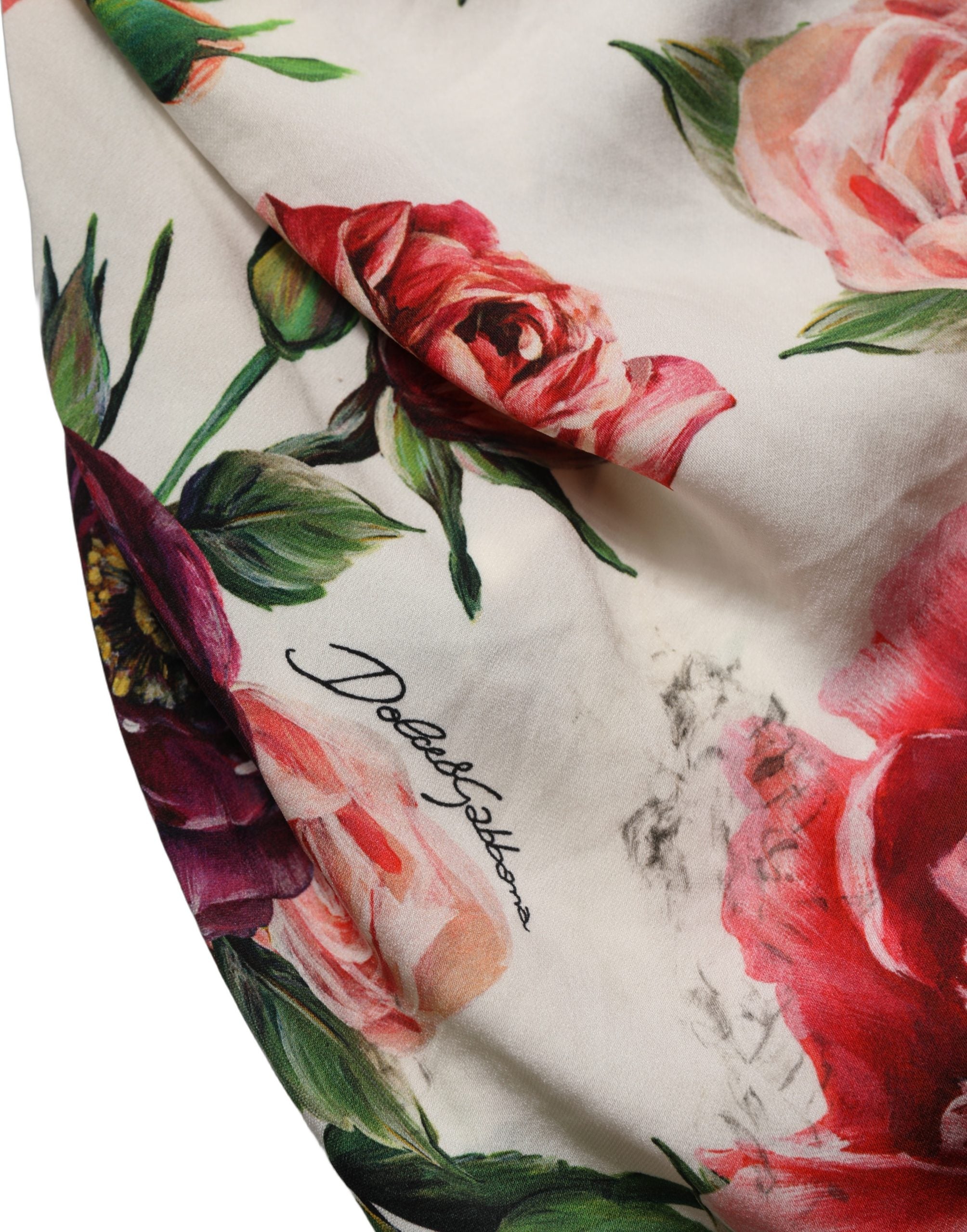 Robe courte blanche sans manches Dolce & Gabbana avec motif floral, coupe ajustée et élégante, parfait pour une occasion spéciale.