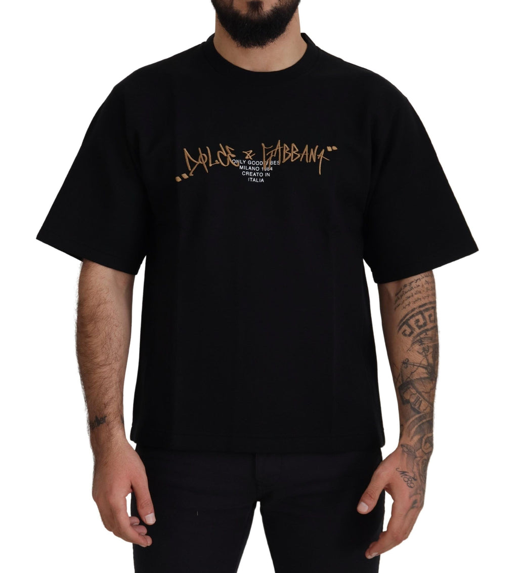 T-shirt homme Dolce & Gabbana en coton noir avec logo, col rond et style casual visible sur l'image.