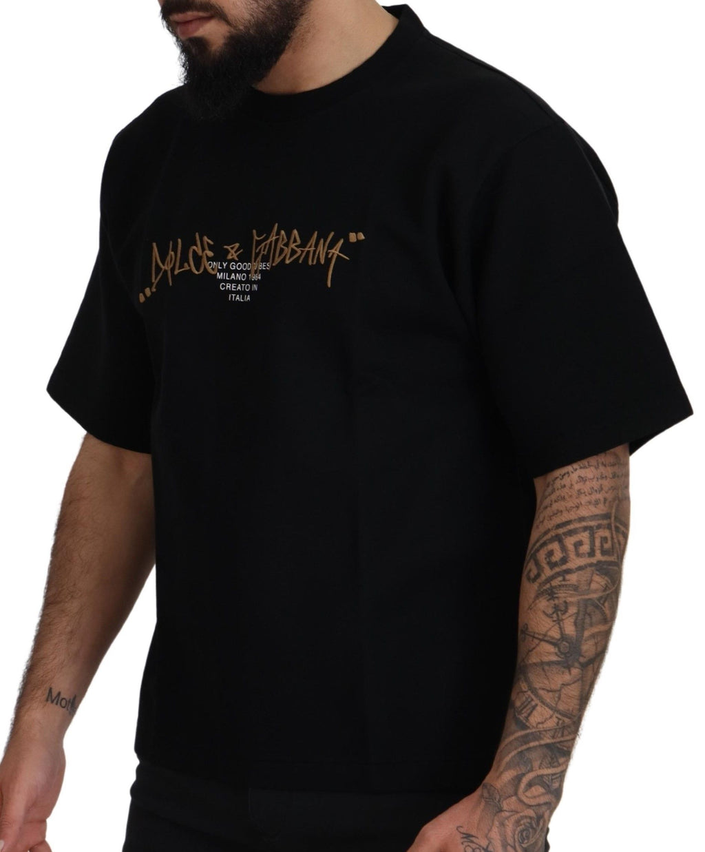 T-shirt noir en coton avec logo Dolce & Gabbana, col rond et design élégant, vue de face.