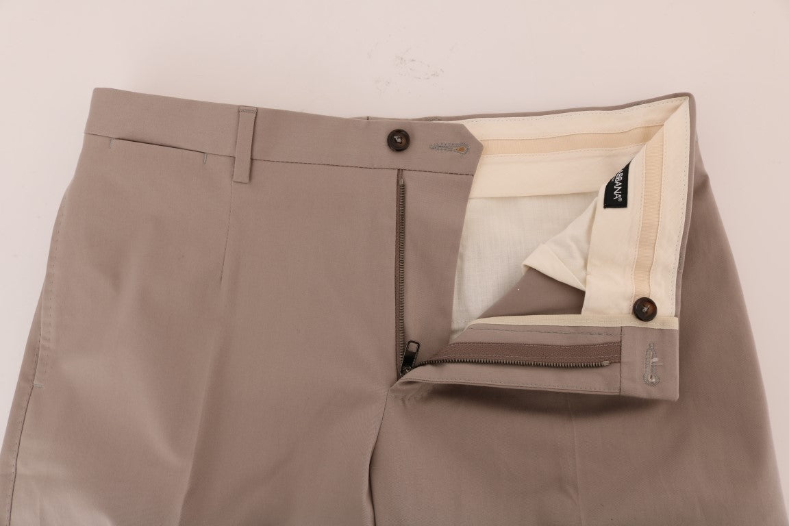 Pantalons chino en coton stretch beige de Dolce & Gabbana, pantalon homme élégant et confortable pour un style décontracté.