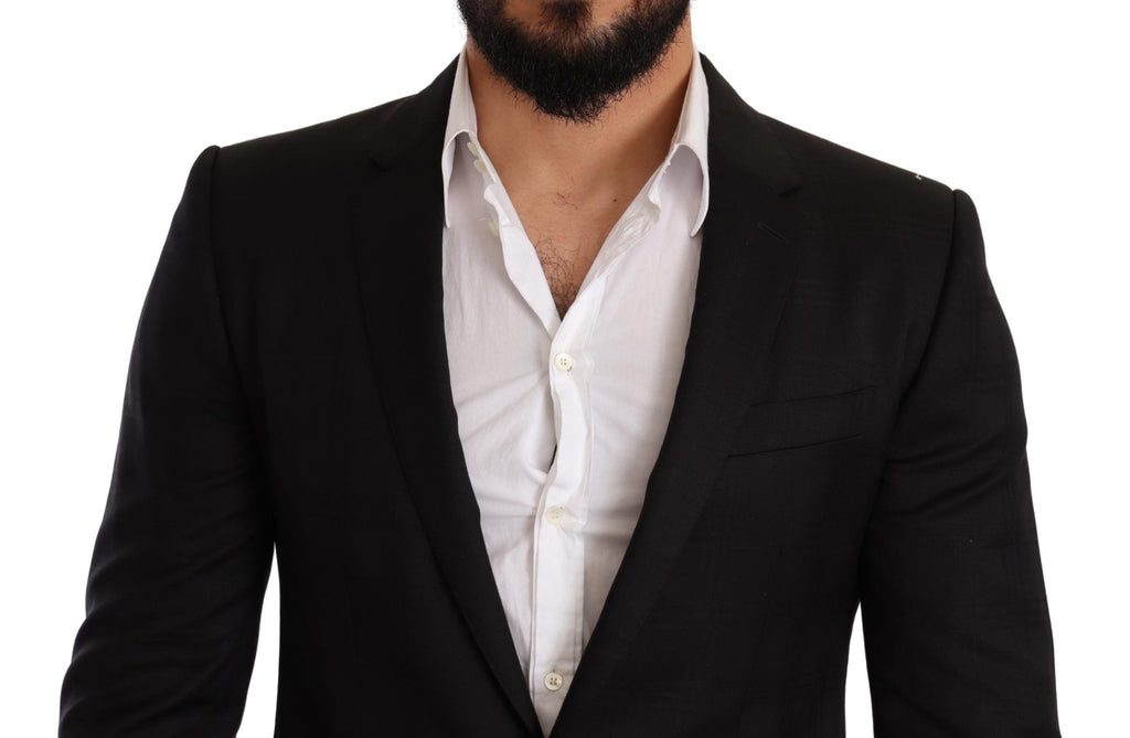 Costume deux pièces Dolce & Gabbana à carreaux noirs, coupe slim fit, élégant et moderne.