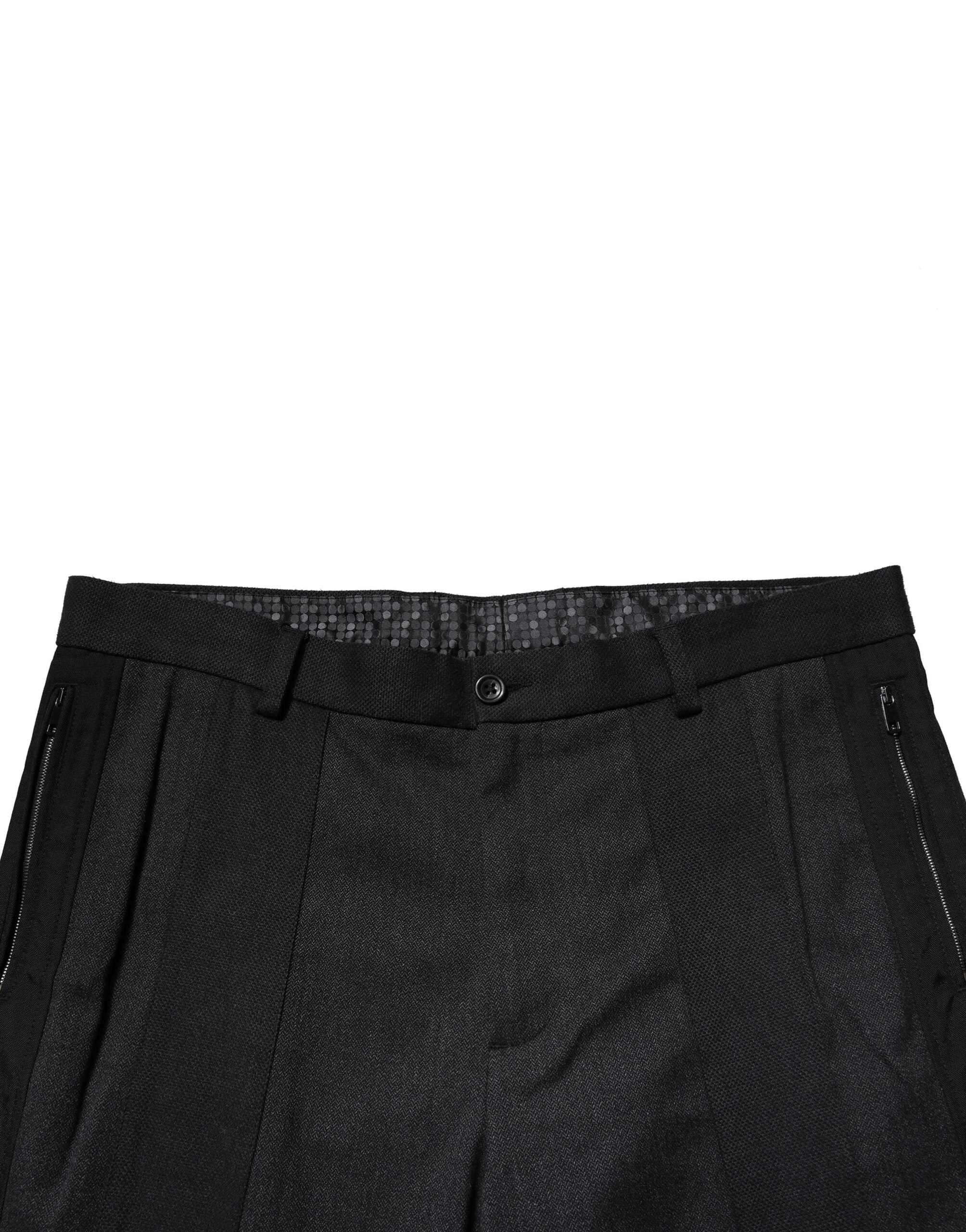 Pantalon slim noir en coton de la marque Dolce & Gabbana, style formel et élégant pour femmes.