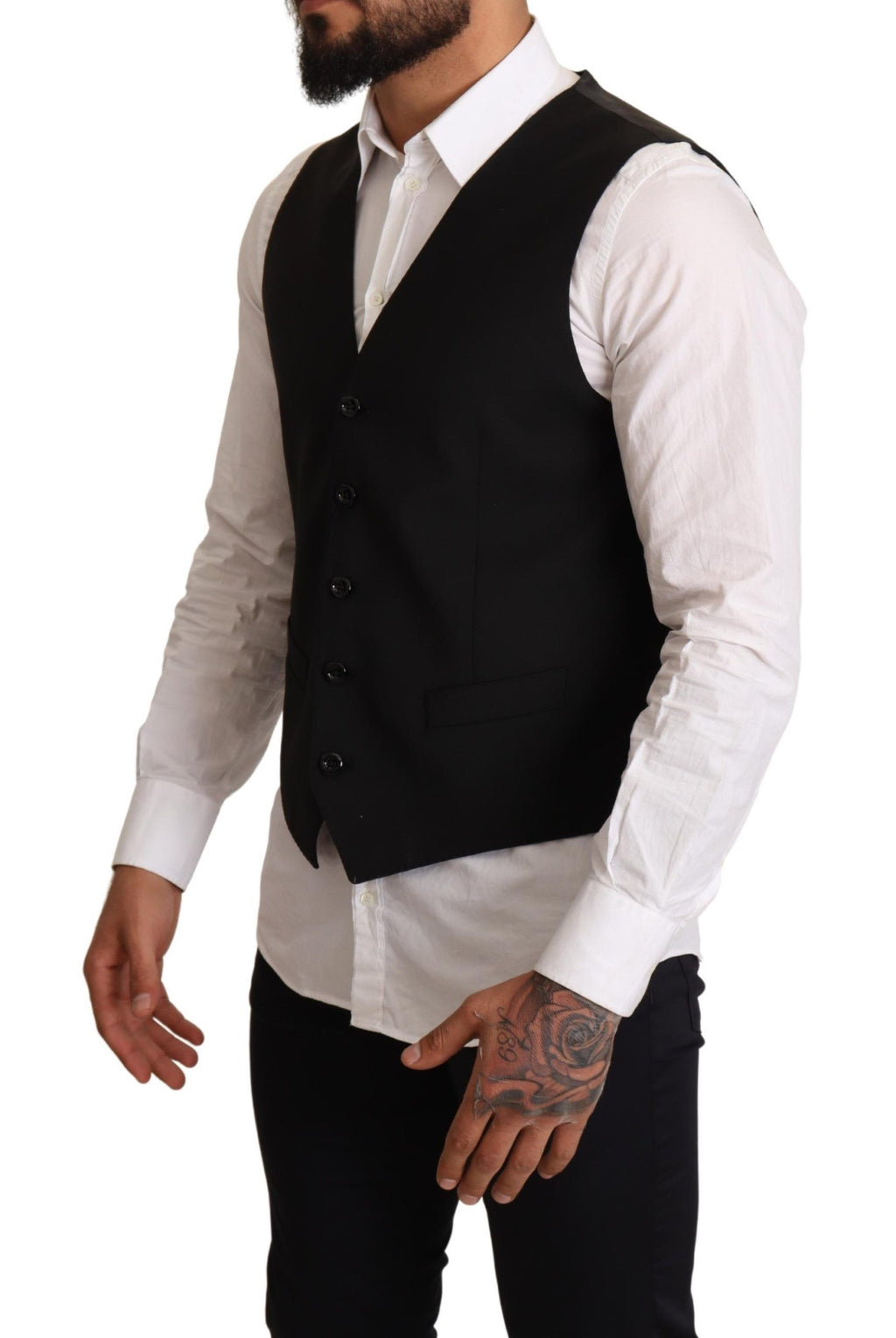 Veste formelle noire Dolce & Gabbana pour femme, design élégant et sophistiqué, en tissu chic et ajusté.