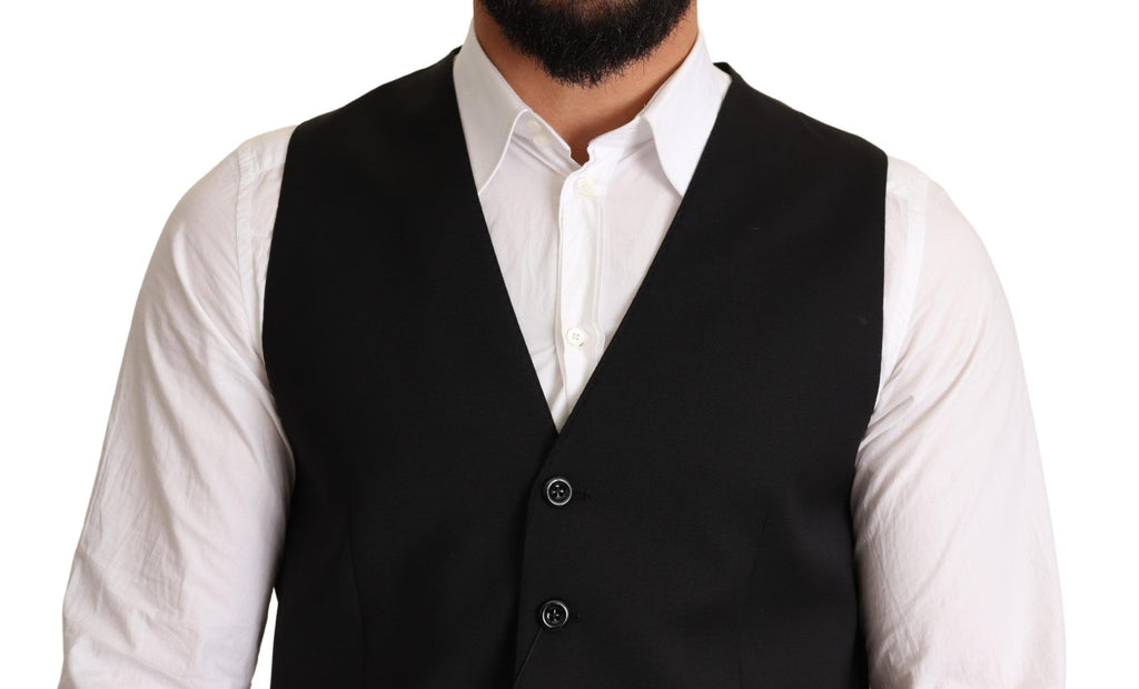 Veste de soirée noire Dolce & Gabbana pour femme, élégante et sophistiquée, en tissu de qualité avec détails modernes.
