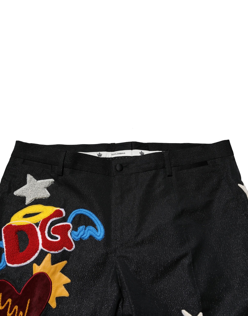 Pantalon homme noir avec broderie graphique Dolce & Gabbana, style élégant et moderne, en tissu de qualité.