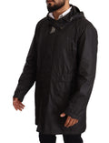 Manteau trench noir à capuche pour homme Dolce & Gabbana, veste élégante avec détails sophistiqués, vue de face.