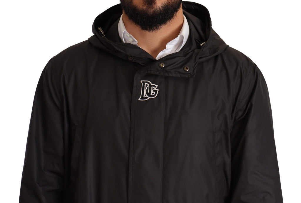 Manteau trench homme noir avec capuche de la marque Dolce & Gabbana, veste élégante et moderne.
