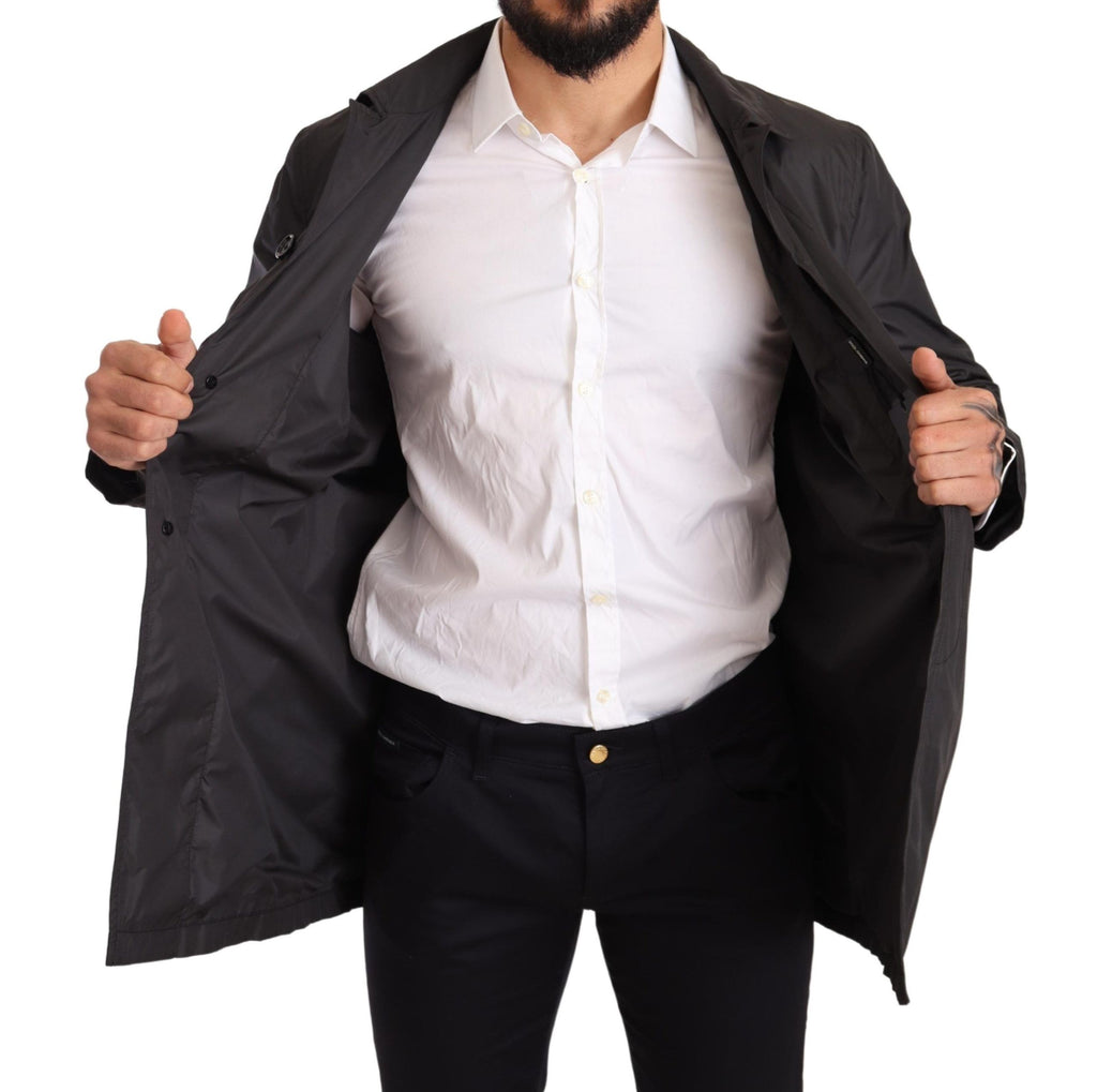 Manteau trench noir en polyester pour homme de Dolce & Gabbana, veste élégante avec col classique et boutons.