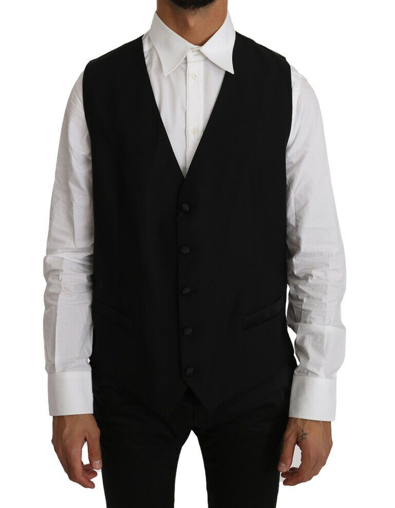 Gilet en laine et soie noire de Dolce & Gabbana, veste classique élégante avec détails soignés, sur un fond neutre
