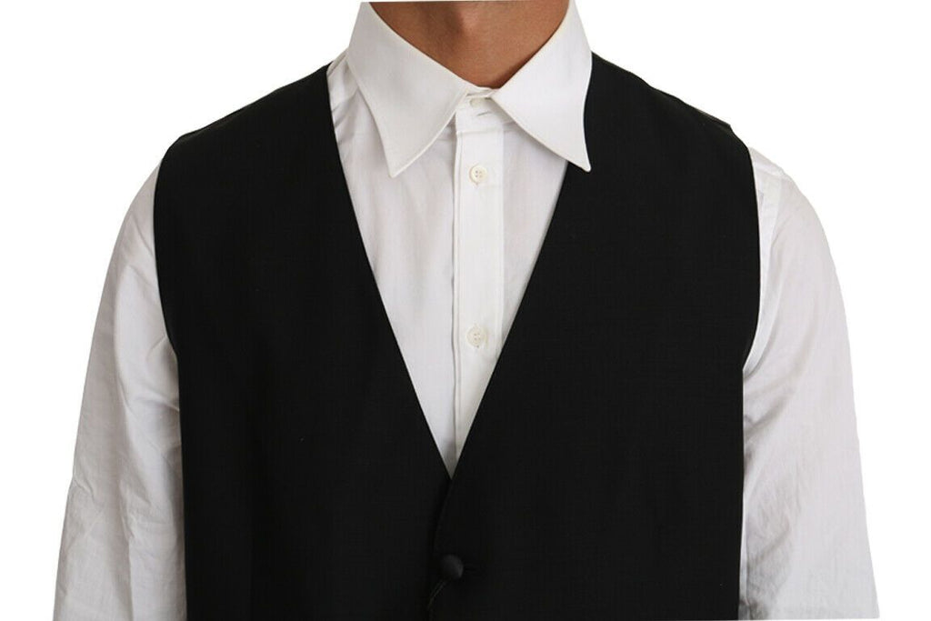 Gilet noir en laine et soie Dolce & Gabbana, ajusté, avec détails élégants en tissu solide.