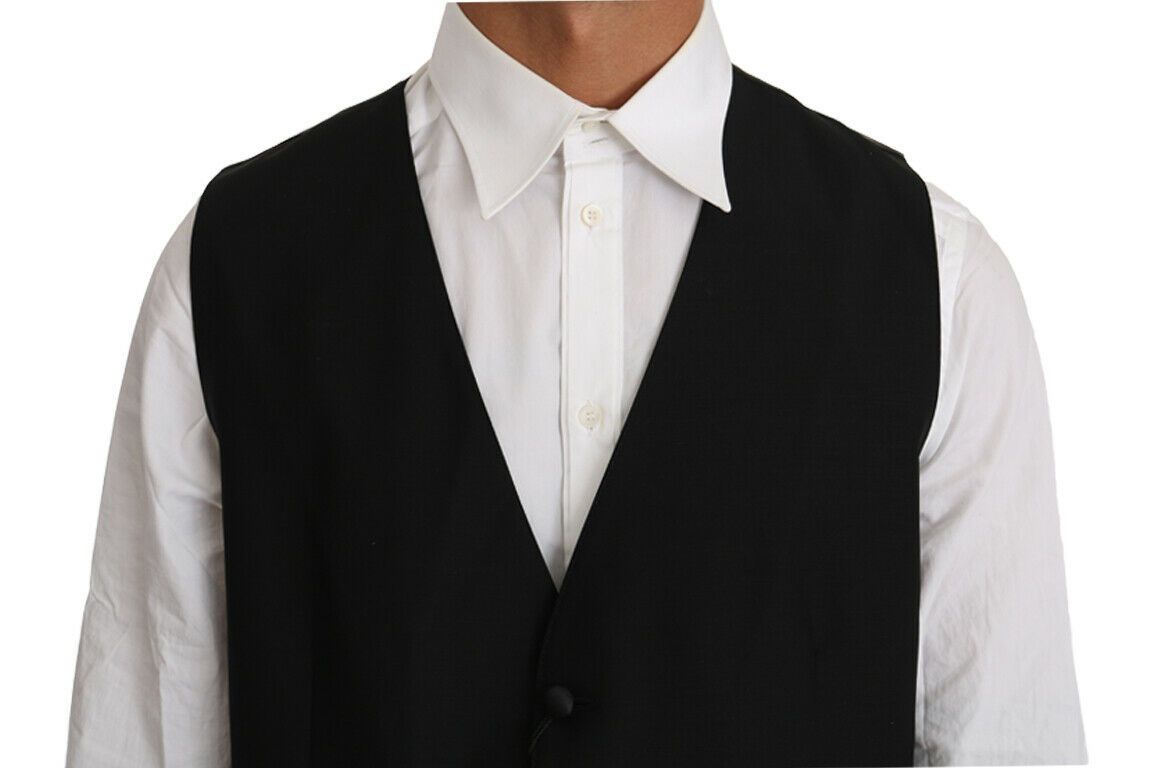 Gilet noir en laine et soie Dolce & Gabbana, ajusté, avec détails élégants en tissu solide.