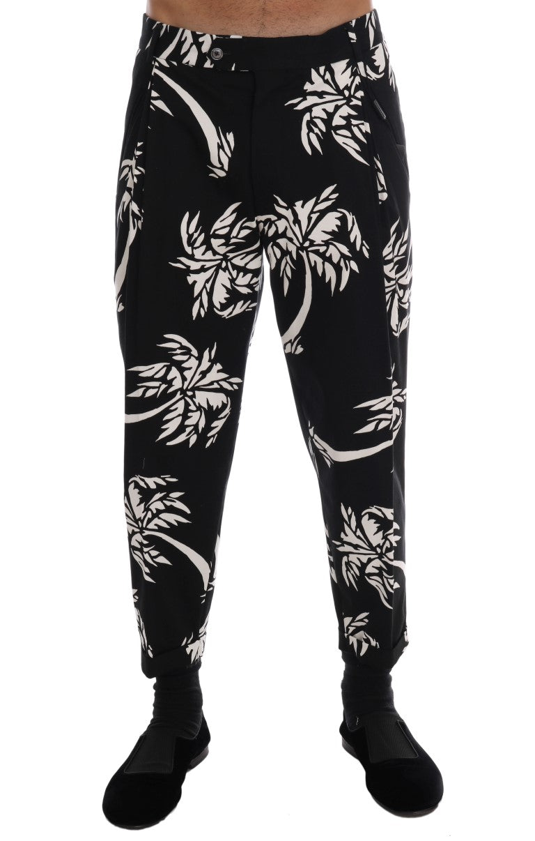 Pantalons noirs en coton extensible Dolce & Gabbana avec motif arbre, coupe moderne et détail élégant.