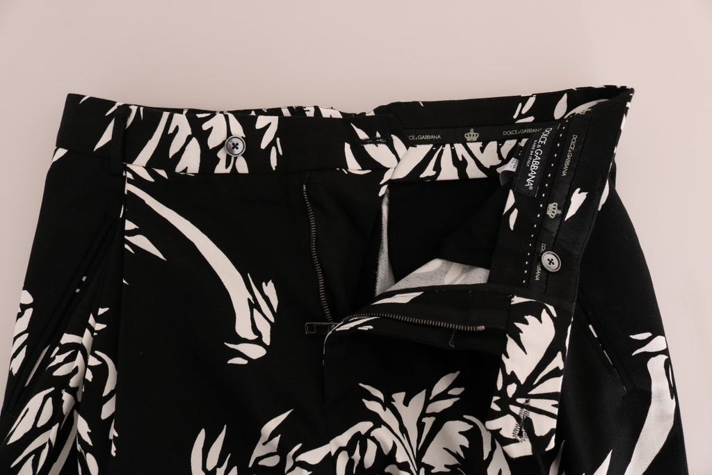 Pantalons en coton stretch noirs Dolce & Gabbana avec motif arbre, style élégant et ajusté pour homme.