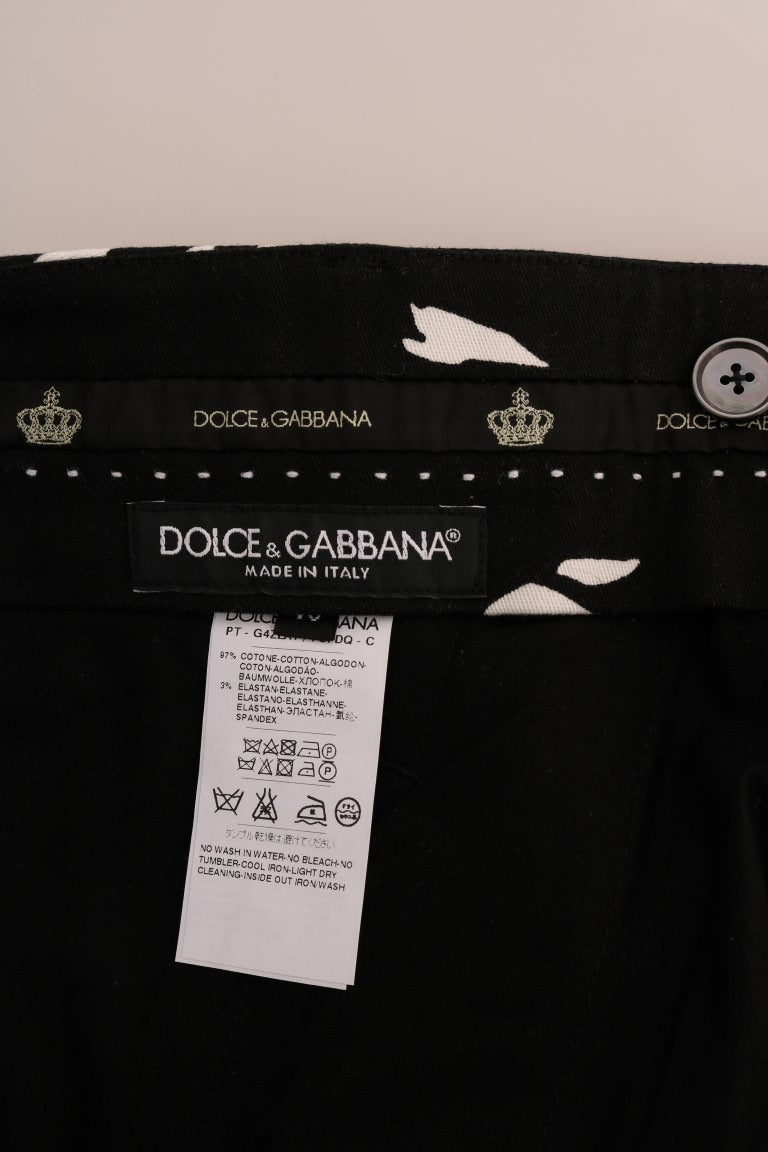 Pantalon noir en coton extensible Dolce & Gabbana avec motif arbre, ajusté et élégant pour un style sophistiqué.