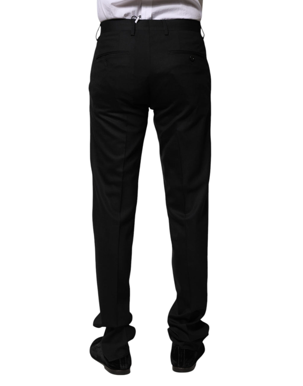 Pantalon formel en laine noire Dolce & Gabbana pour femme, coupe élégante et tissu de qualité visible sur l'image.