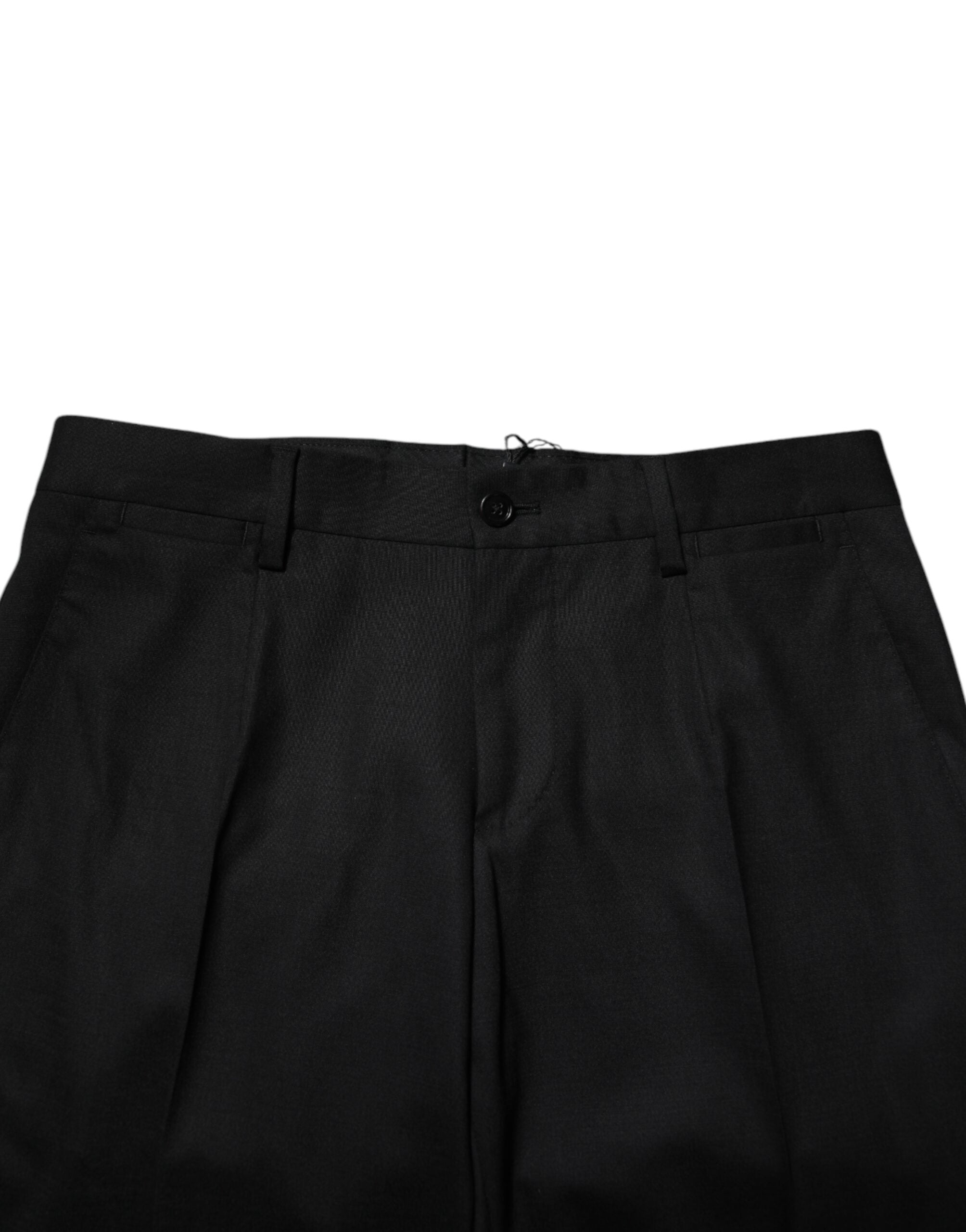Pantalon de costume en laine noire Dolce & Gabbana pour femme, coupe élégante et finition sophistiquée.