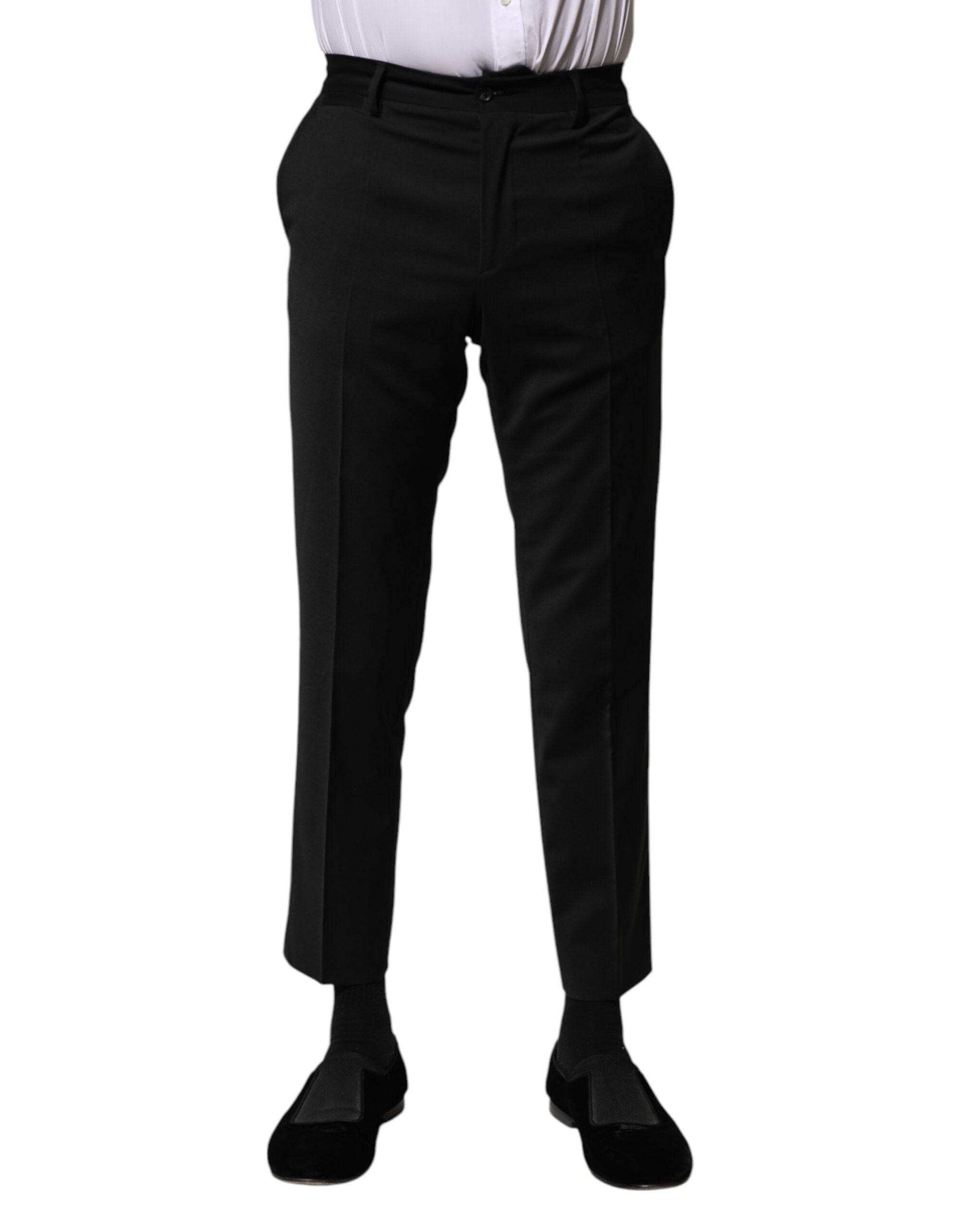 Pantalon homme Dolce & Gabbana en laine noire, coupe formelle et courte, style élégant et moderne.
