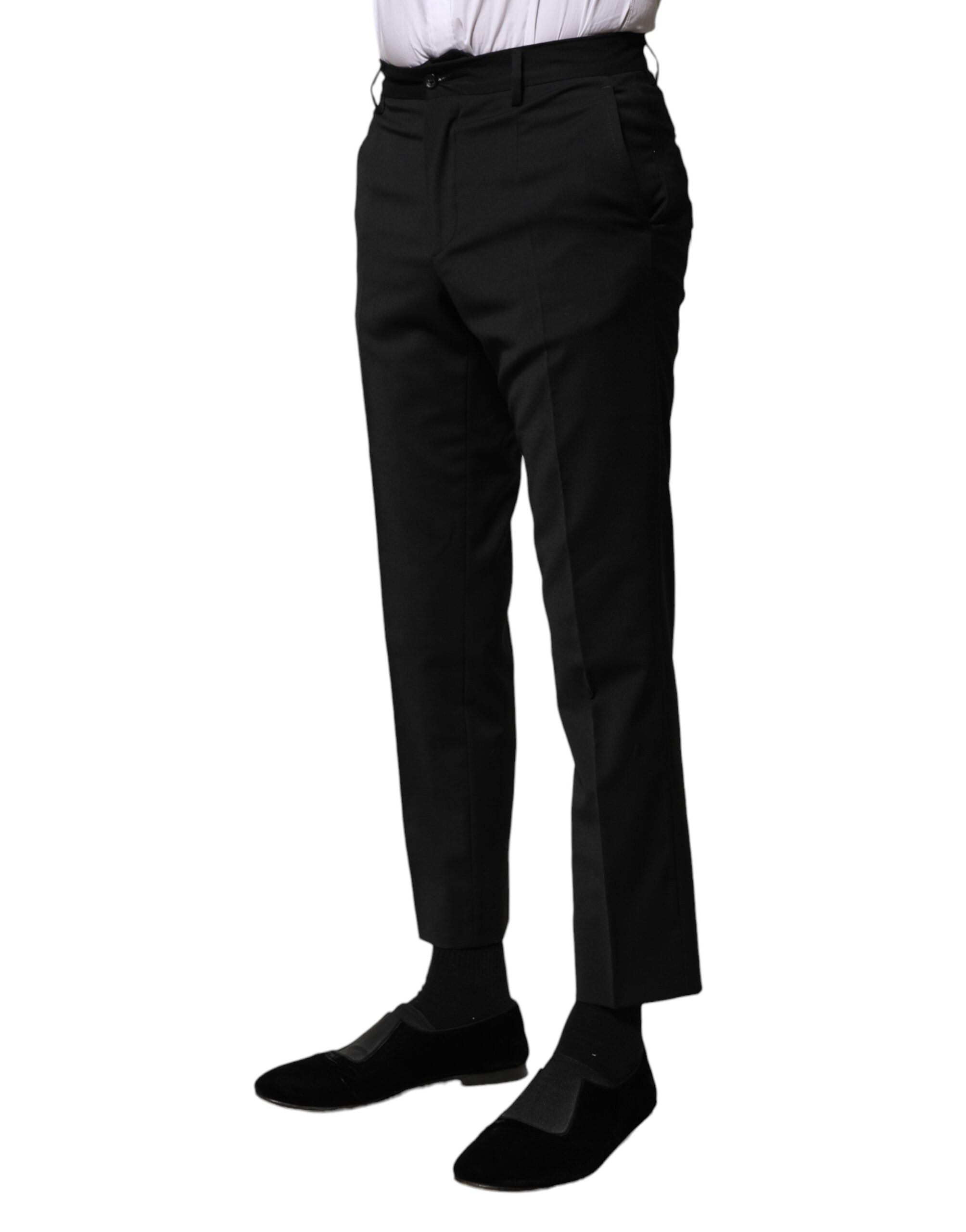 Pantalon formel pour homme en laine noire de Dolce & Gabbana, coupe courte, élégance moderne et sophistiquée.