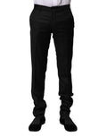 Pantalons homme formels en laine noire Dolce & Gabbana, coupe slim, élégants et sophistiqués, avec détails de couture visibles.