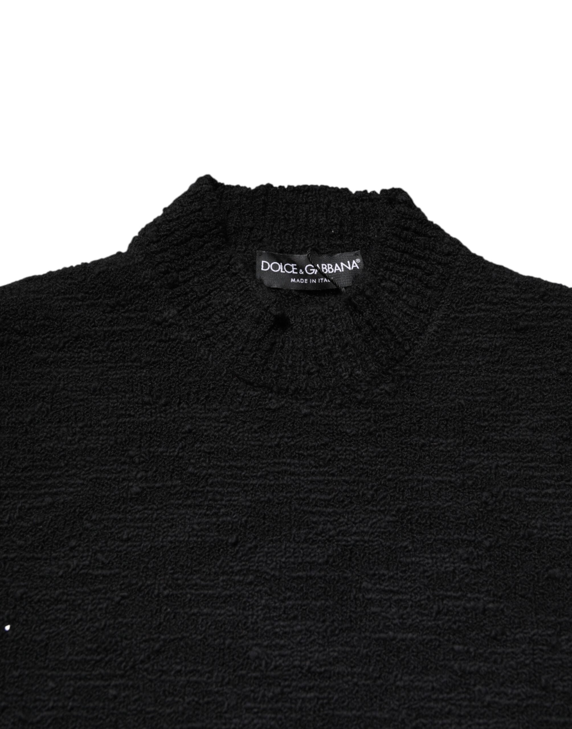 Pull à col rond en laine noire de Dolce & Gabbana, pull-over élégant avec texture douce et finition soignée.