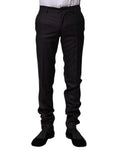 Pantalon formel en laine noire à motif de Dolce & Gabbana, élégant et sophistiqué, visible sur l'image.