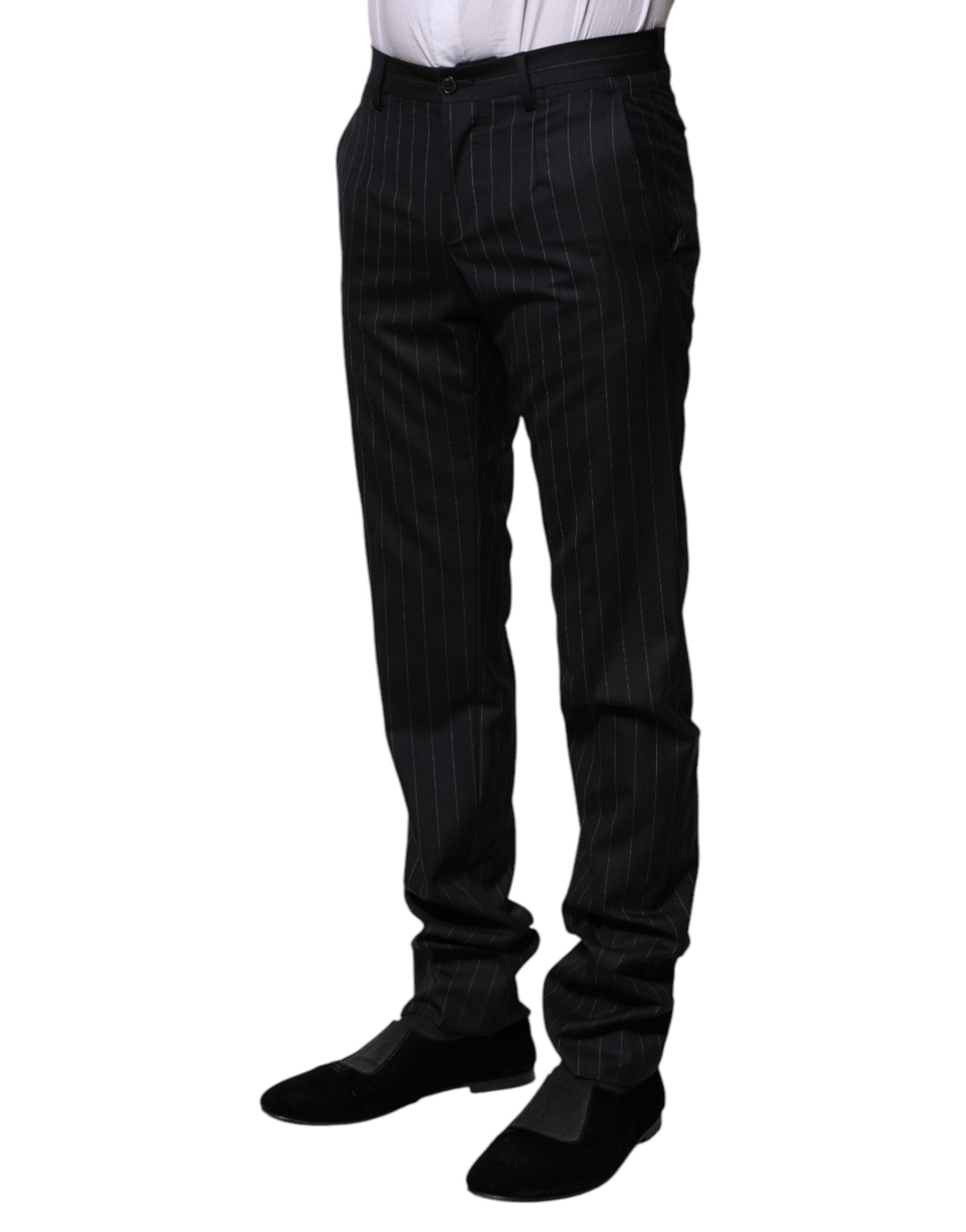 Pantalon formel en laine noire à rayures de Dolce & Gabbana, élégant et sophistiqué, visible en détail dans l'image.