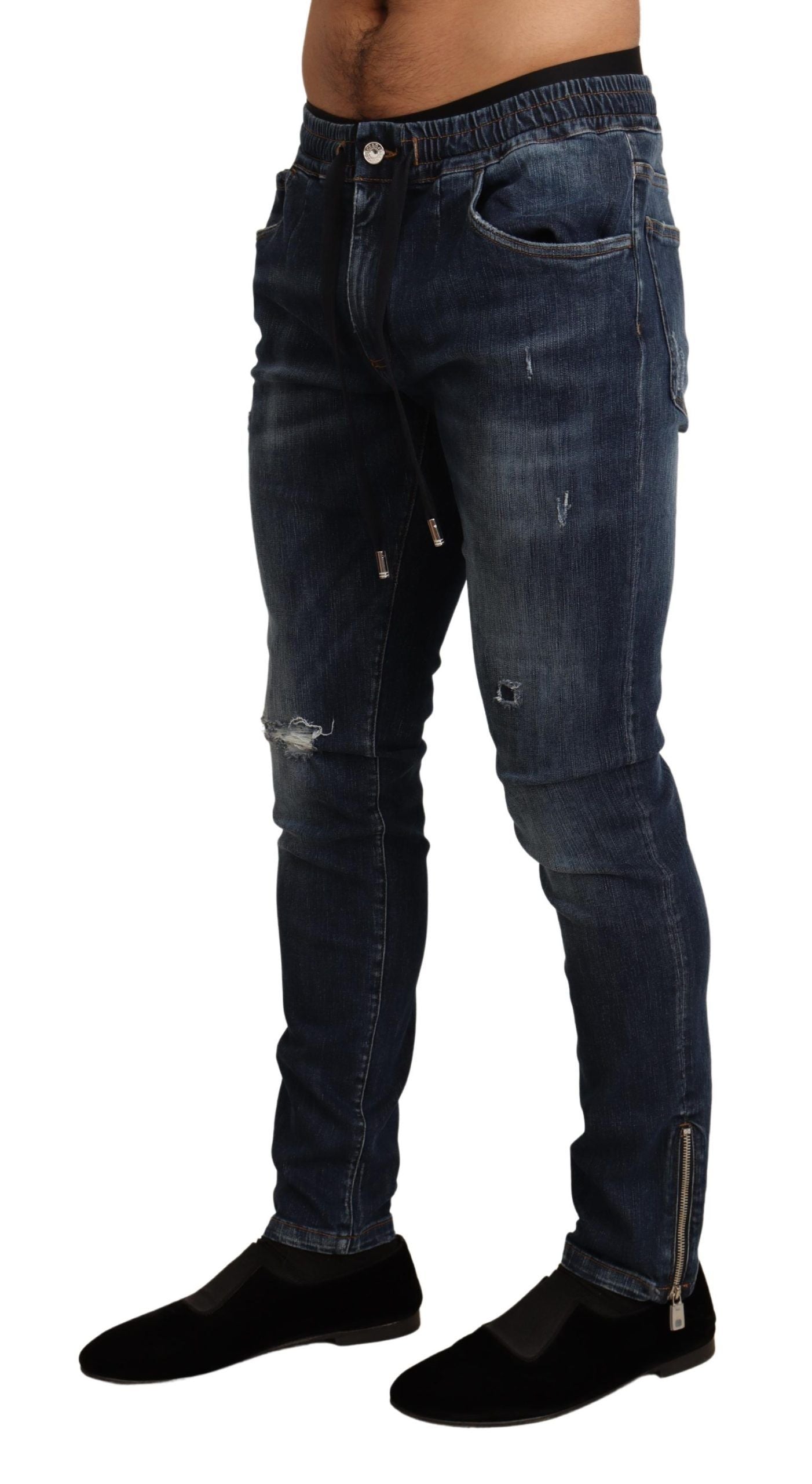 Jeans en denim tattered bleu Dolce & Gabbana en coton extensible, décontractés et à coupe ajustée.