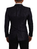 Manteau en jacquard de soie à fleurs bleues Dolce & Gabbana Martini blazer, détail de texture et design élégant.