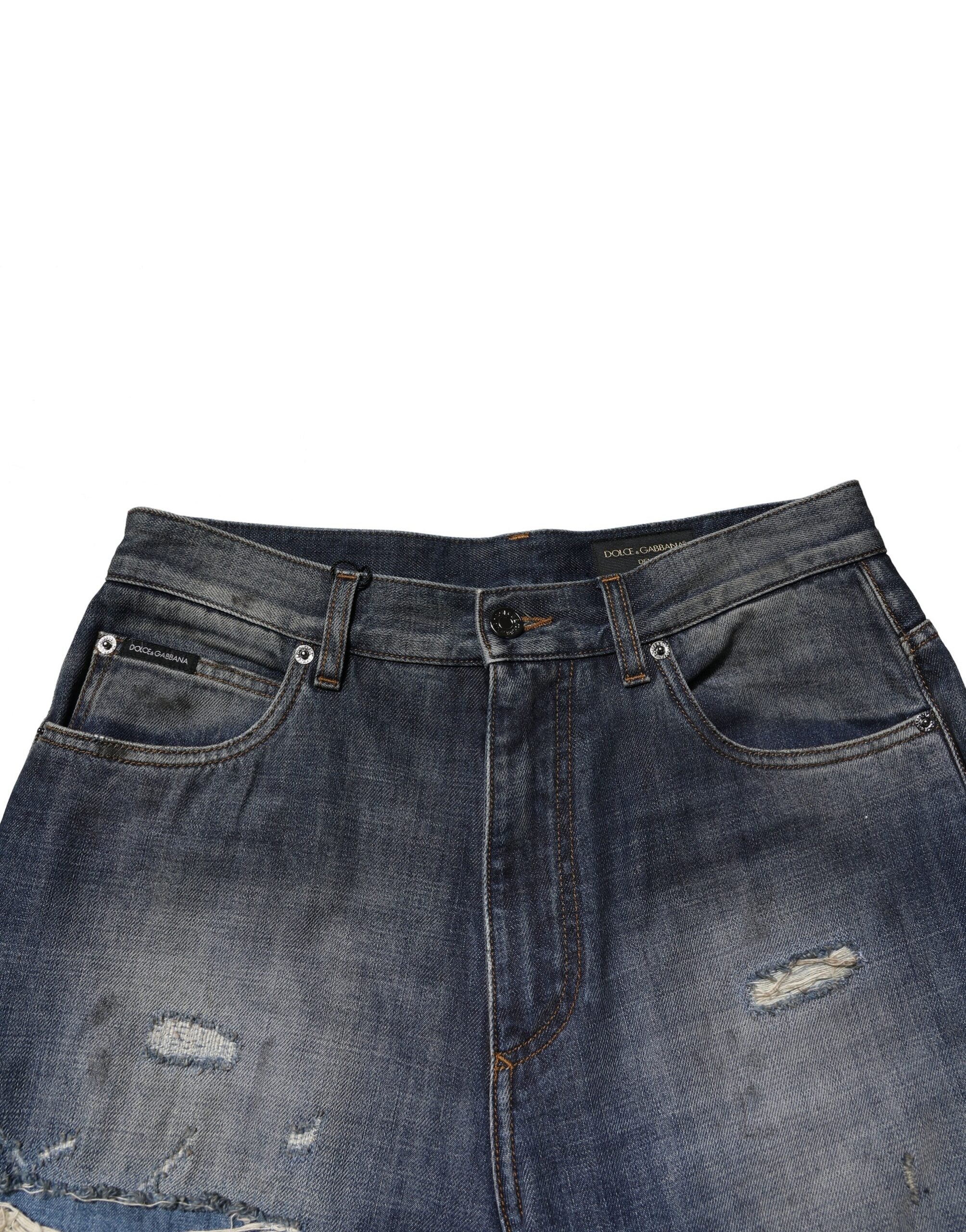 Jeans pour hommes en coton délavé et usé de Dolce & Gabbana, style tattered, bleu, avec détails déchirés.