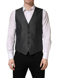 Gilet homme gris foncé Dolce & Gabbana à simple boutonnage, élégant et ajusté, en tissu de haute qualité.