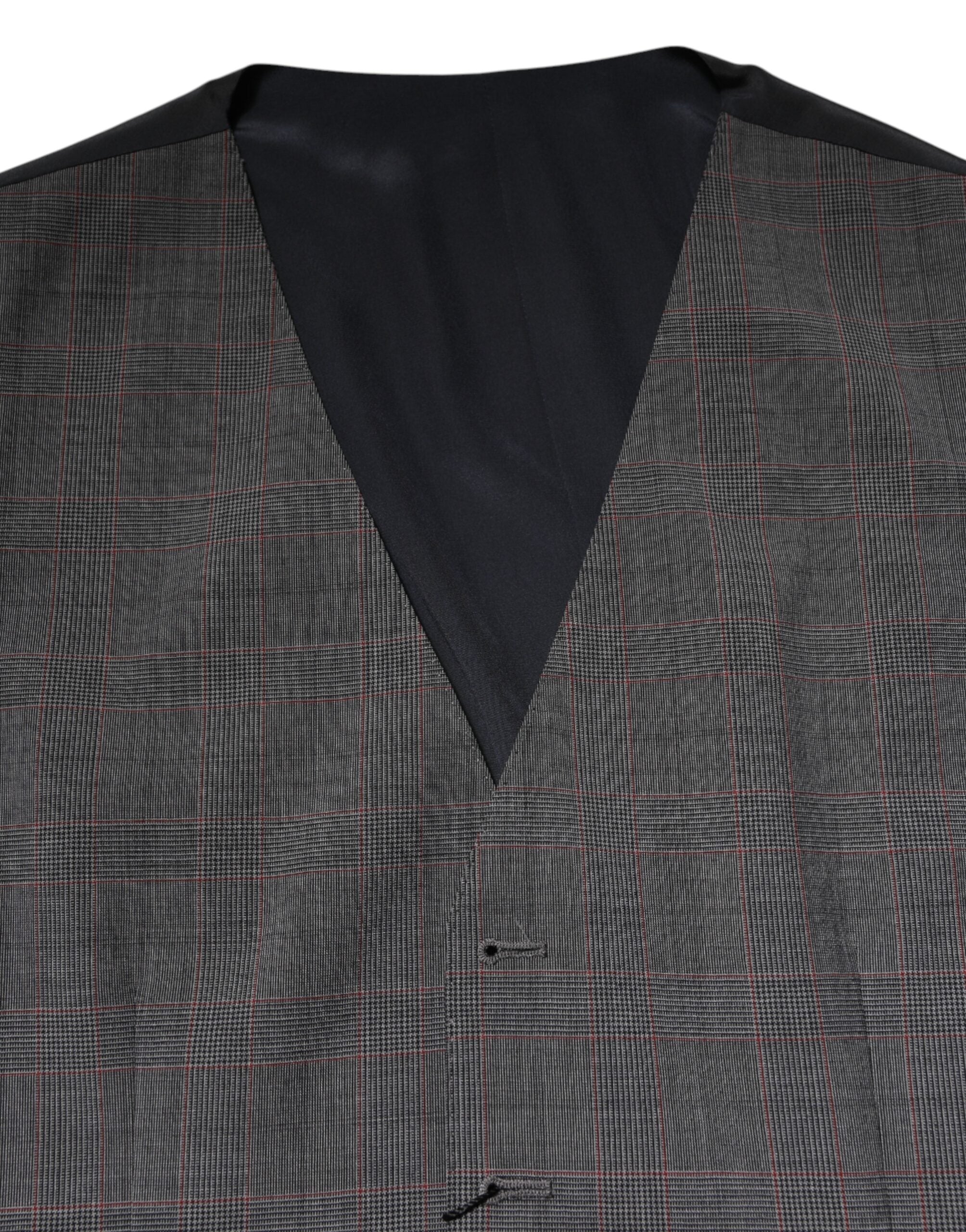 Gilet formel en laine à carreaux gris de Dolce & Gabbana, veste élégante avec coupe ajustée et détails sophistiqués.