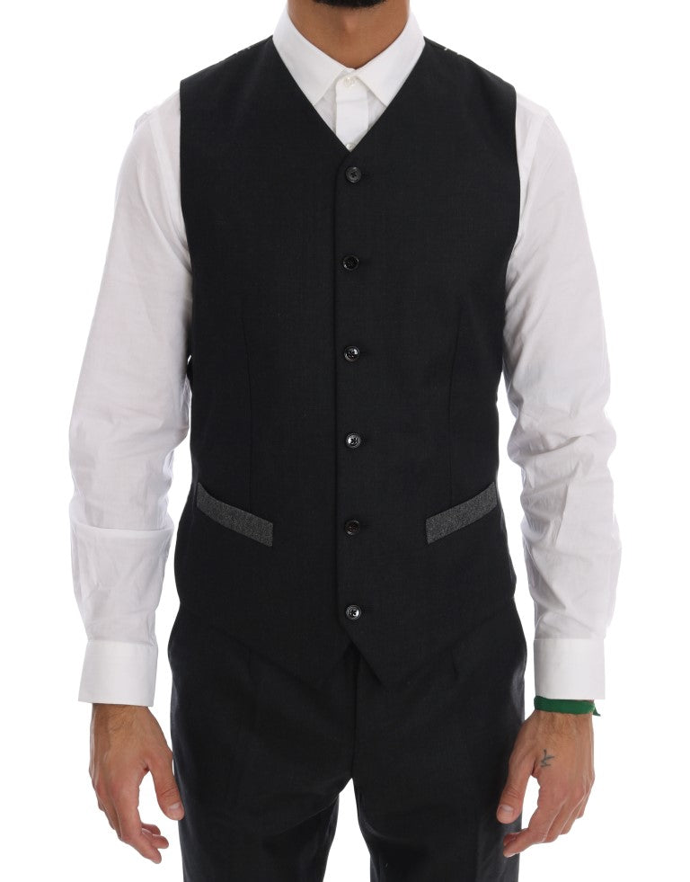 Costume trois pièces en laine grise Dolce & Gabbana avec veste à double boutonnage et pantalon assorti, élégant et sophistiqué.