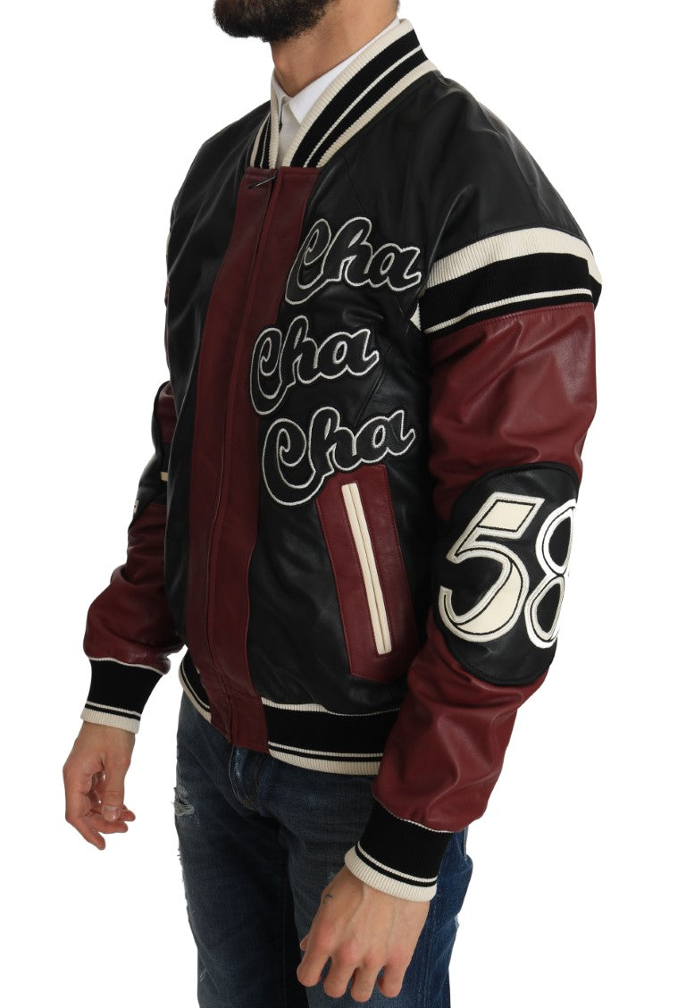 Veste en cuir noir et rouge Dolce & Gabbana, style club lounge, avec détails élégants et coupe moderne.