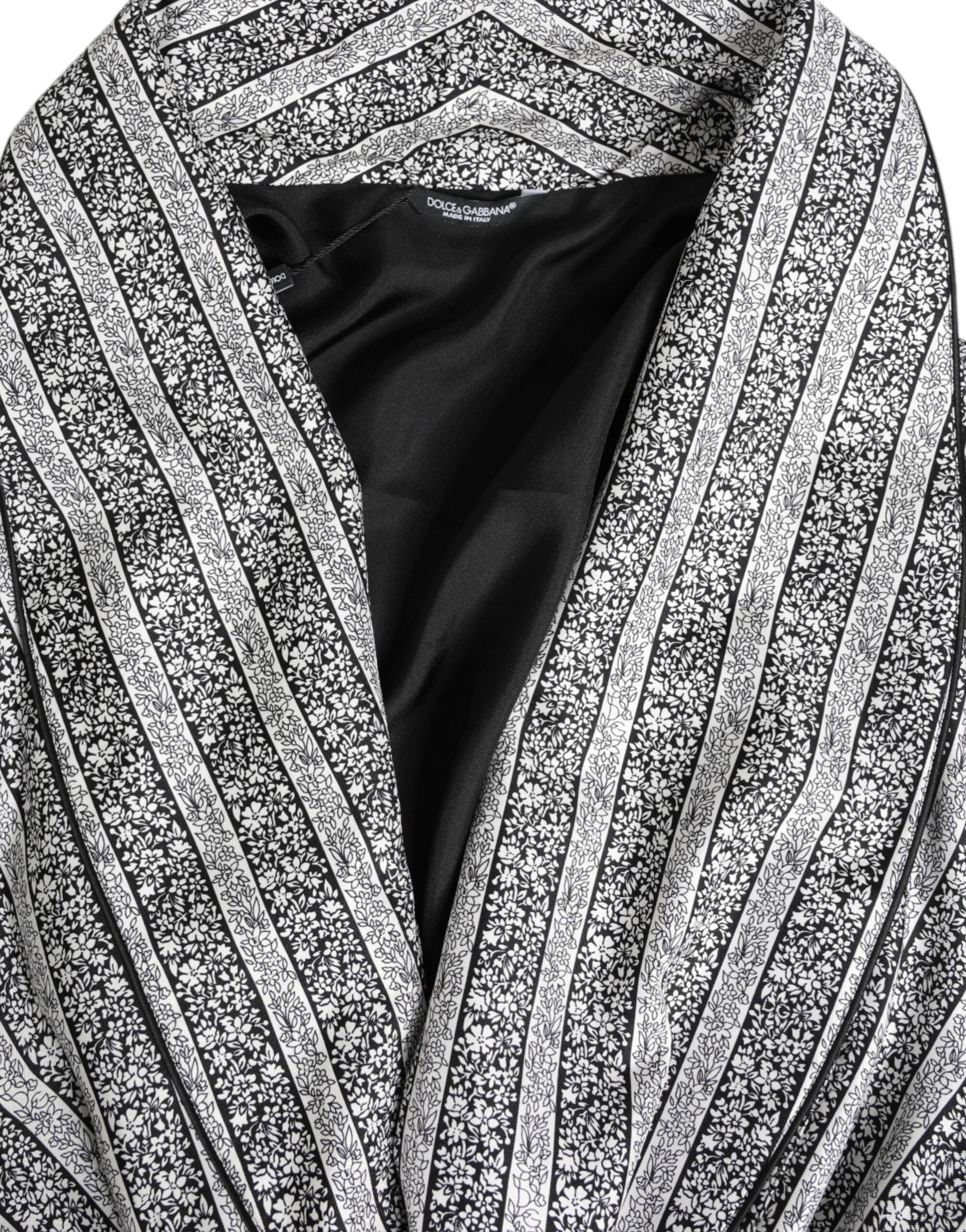 Robe-coat Dolce & Gabbana multicolore à fleurs, veste wrap élégante avec motifs floraux vibrants et coupe sophistiquée.