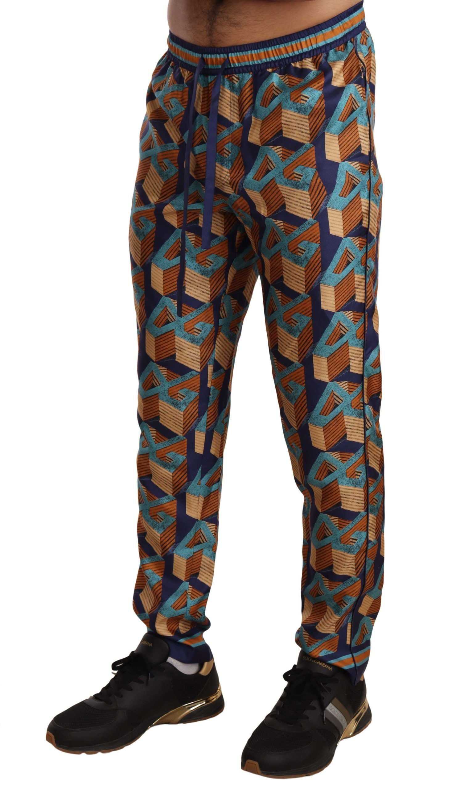 Pantalon jogging en soie Dolce & Gabbana à motif multicolore, pantalon décontracté élégant avec design coloré.
