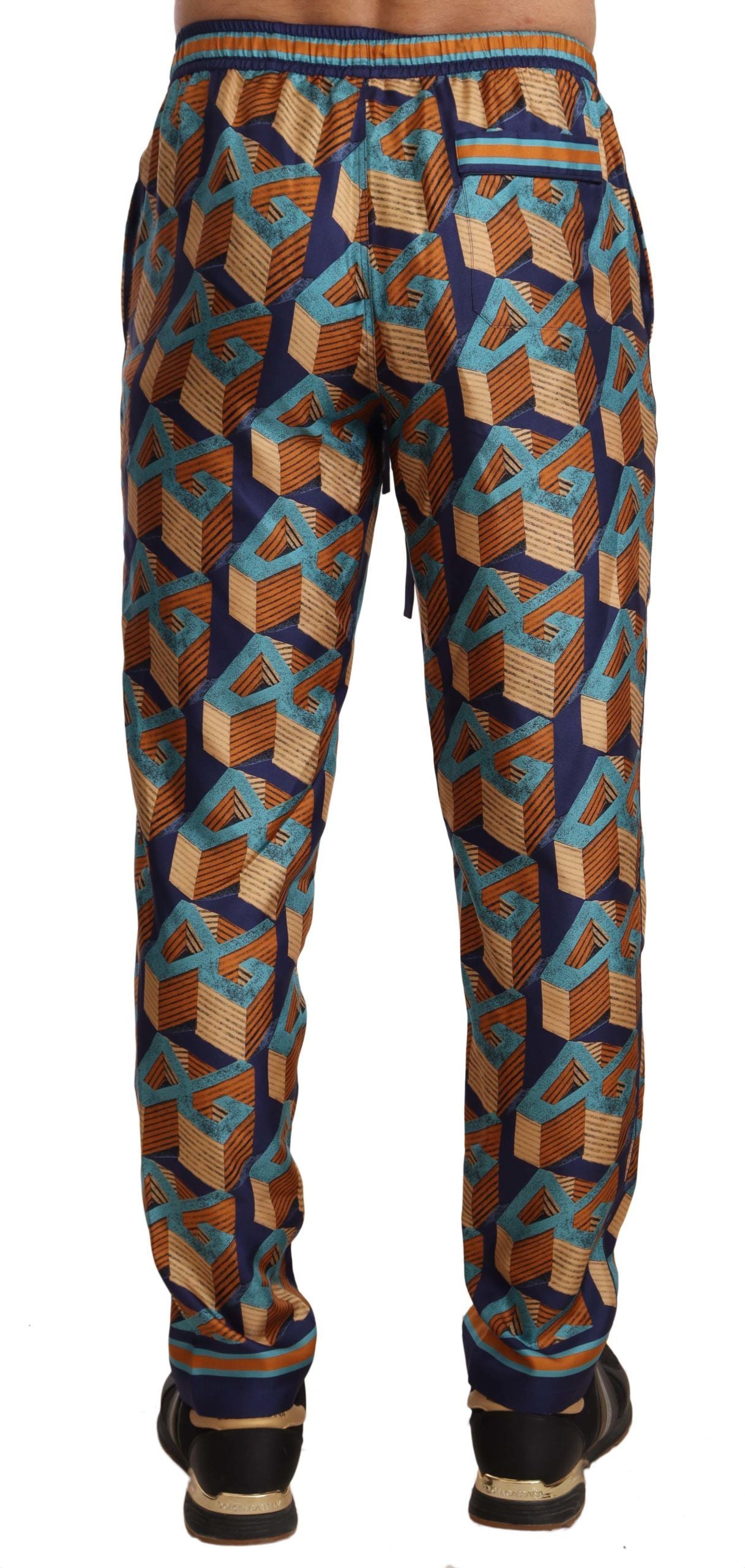 Pantalon jogger en soie Dolce & Gabbana à motif multicolore, style décontracté et élégant avec ceinture élastique.